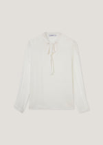 Blusa plumetis con fiocco