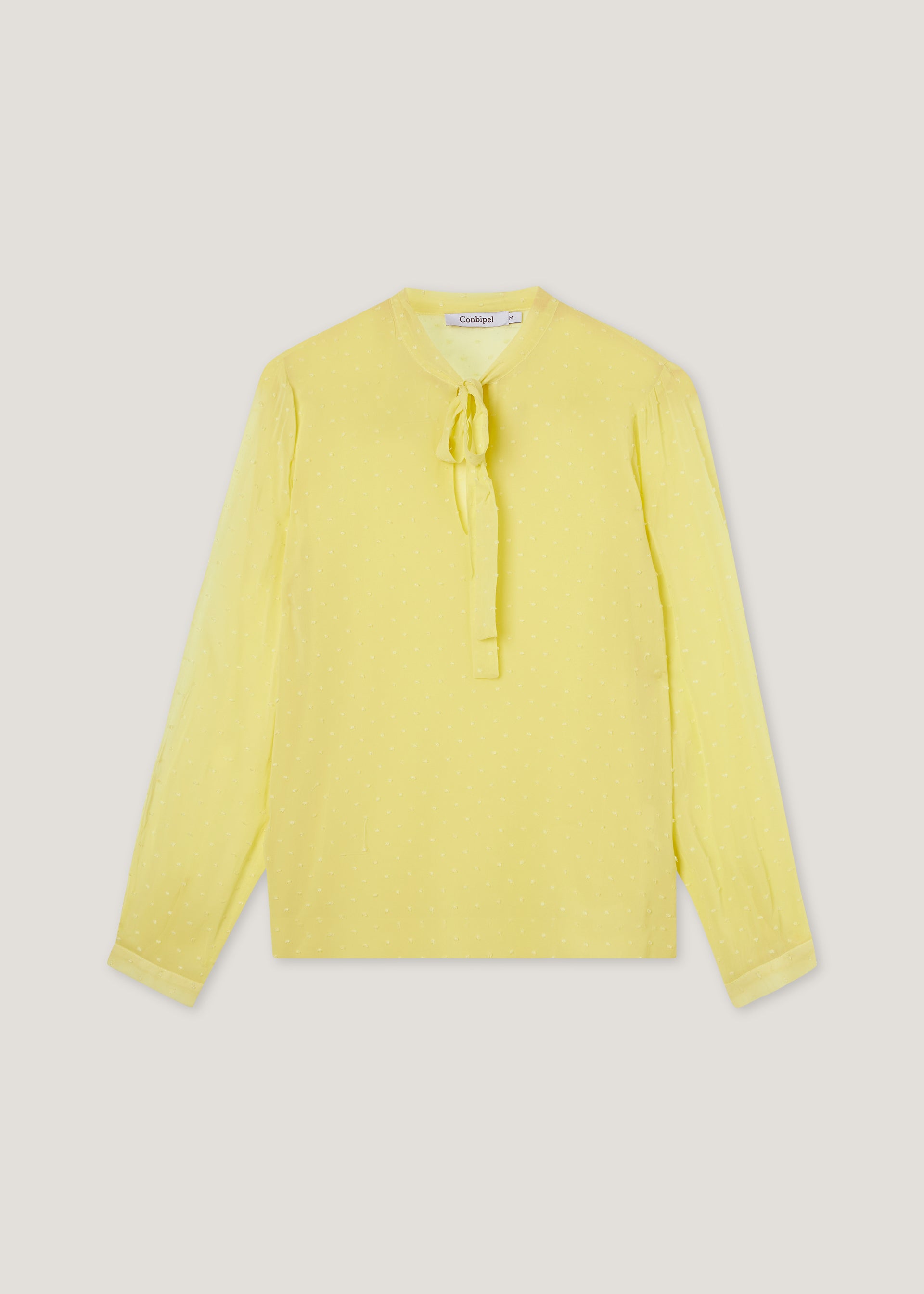 Blusa plumetis con fiocco