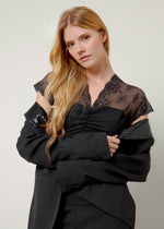 Top in pizzo bimateriale