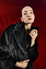 Cappotto in pelliccia sintetica