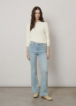 Jeans slim flare con strass