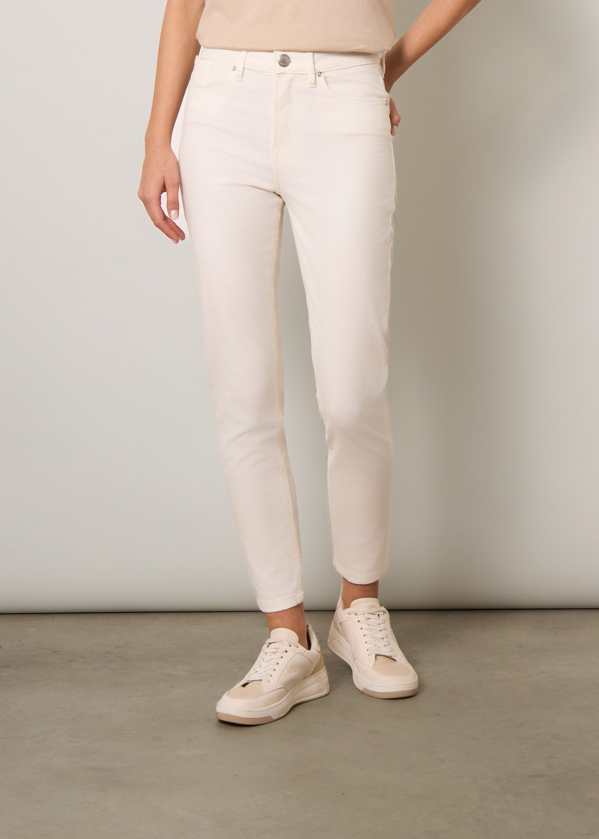 Pantaloni skinny a vita alta