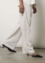 Pantaloni ampi in misto lino gessati