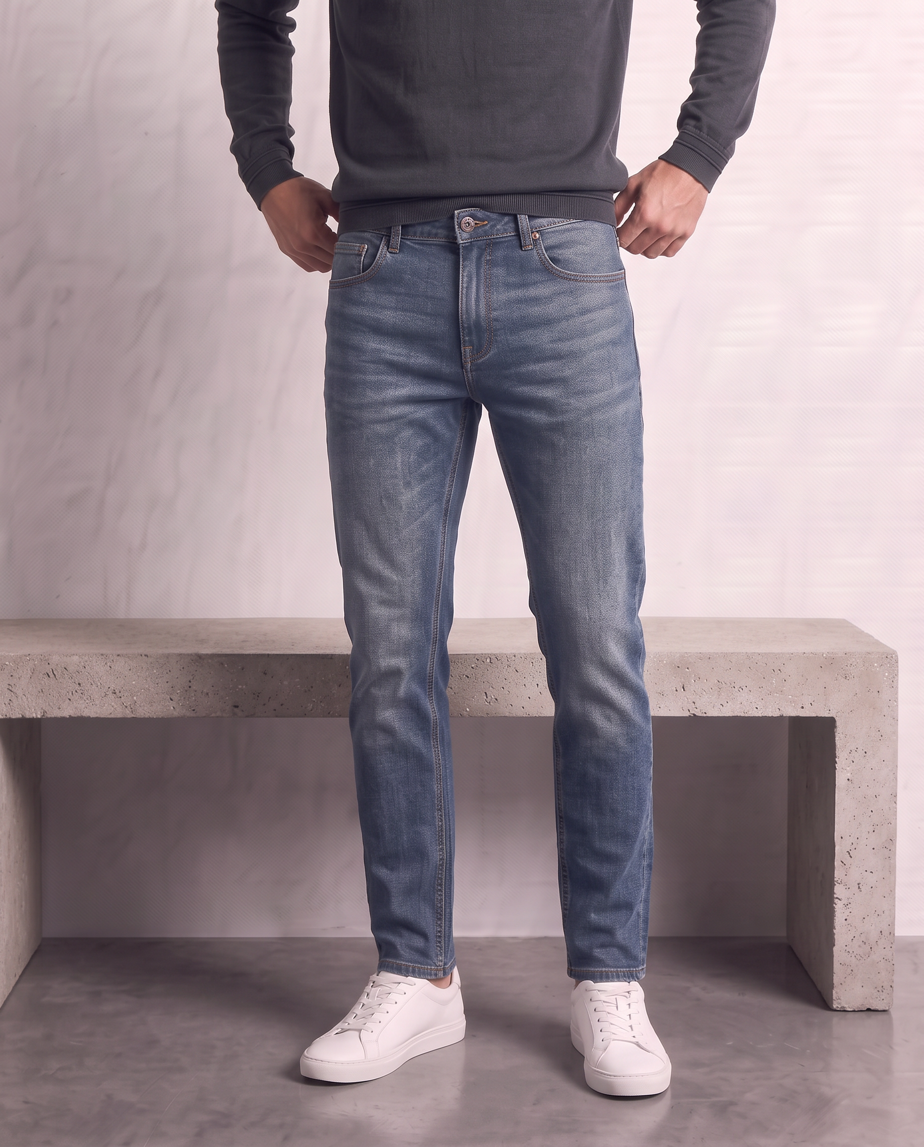 Jeans skinny con bottone
