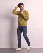 Jeans skinny con bottone