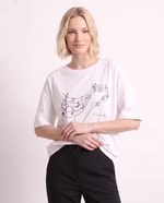 T-shirt con stampa musicale e strass