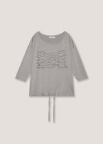 T-shirt over con applicazioni