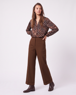 Pantaloni a gamba larga con piega